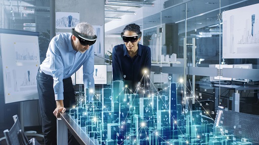 Male and Female Architects Work with Holographic Augmented Reality 3D City Model. Technologically Advanced Office Professional People Use Virtual Reality Modeling Software Application.